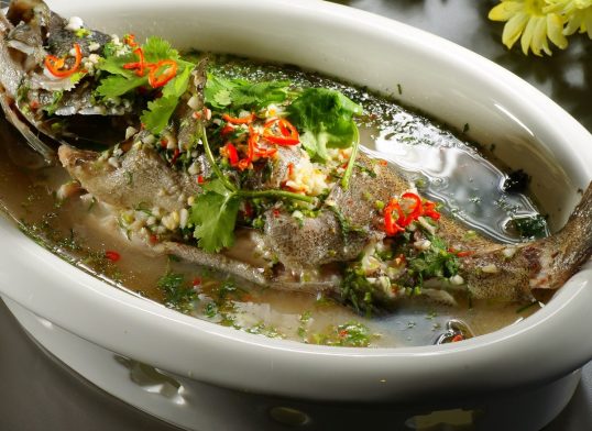 Special braised grouper fish with soup in chinese style in white