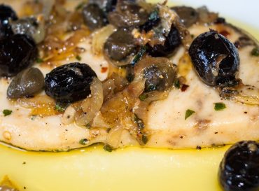 Delicious swordfish with sweet and sour onions and olives