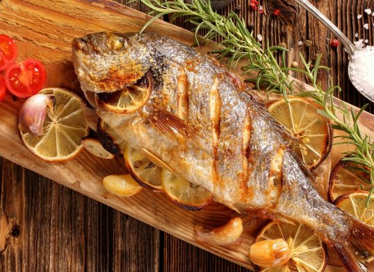 Grilled fish on the table