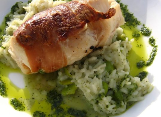 monkfish wrapped in palma ham on a bed of mint ris