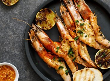 Grilled butterflied prawns