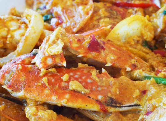 soft focus of homemade stir-fried crab in yellow curry powder