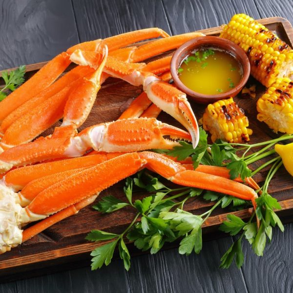 Crab legs, grilled corn in cobs