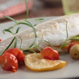 14334389 - baked sea bass with cherry tomato, olives, and rosemary