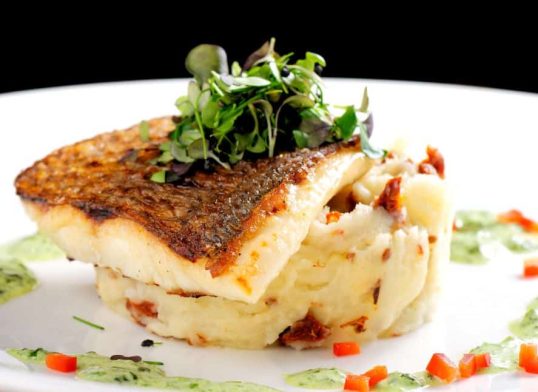 baked mullet with garlic herb sauce