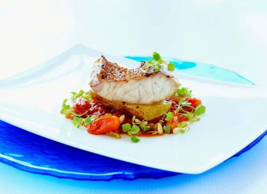 red snapper with roasted garlic and tomatoes