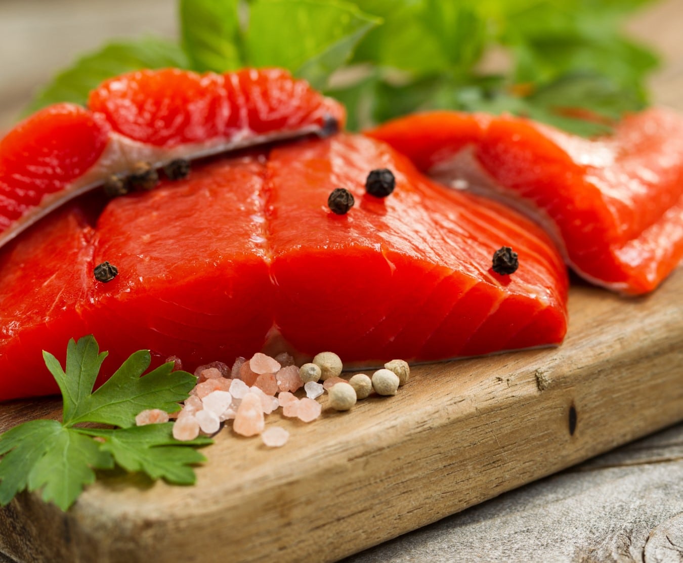 Sockeye Salmon Fillets On Chopping Board