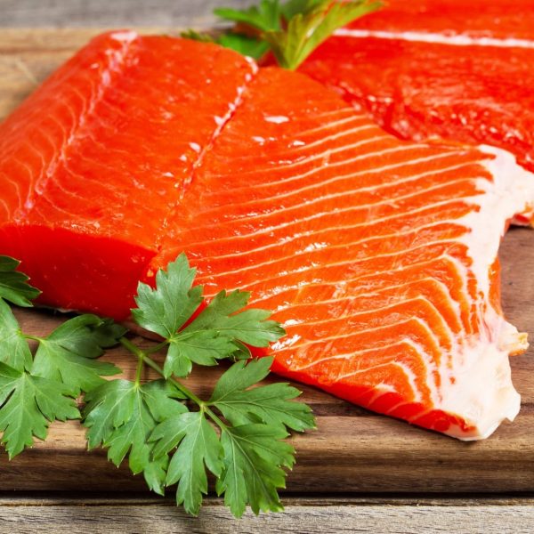 Salmon Fillets On Wooden Board